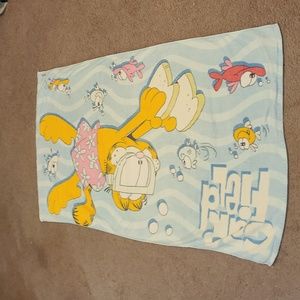 Vintage Garfield beach towel on a Paws tag.
